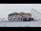 Images of collapsed Baltimore bridge and container ship