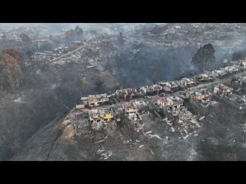 Burnt houses after wildfire in Chile that leave at least 19 dead