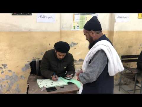 Pakistanis cast their ballots at polling station in Islamabad