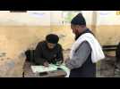 Pakistanis cast their ballots at polling station in Islamabad