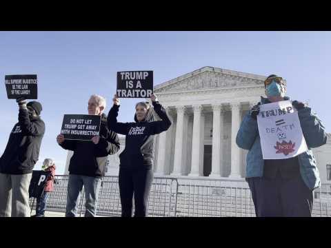 Anti-Trump and pro-Trump protesters gather outside US Supreme Court