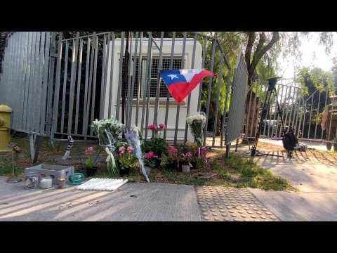 People lay flowers outside home of ex-Chile president Pinera after death in helicopter crash