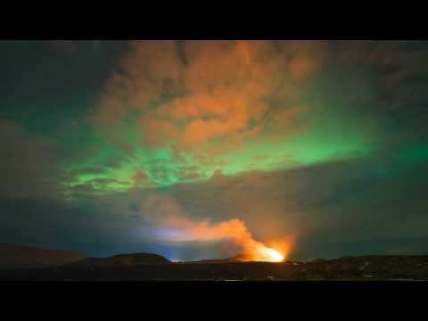 Auroras and volcano light up the Icelandic sky