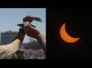 Hundreds of Mexicans watch total solar eclipse in the capital