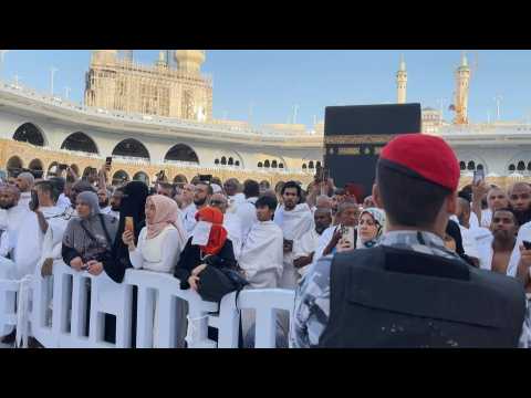 Muslims perform Eid al-Fitr prayers at Mecca's Grand Mosque