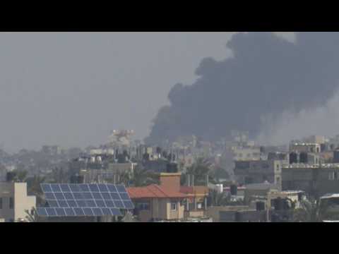 Smoke rises from central Gaza, seen from Rafah