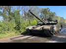Ukrainian tanks and armoured vehicles on the roads of Donbas