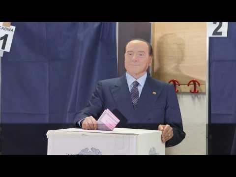 Italy's former PM Silvio Berlusconi casts vote in national election