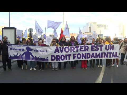Protesters march in Paris on World Abortion Rights Day