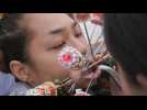 Thaïlande: le piercing extrême, rituel d'un festival très populaire