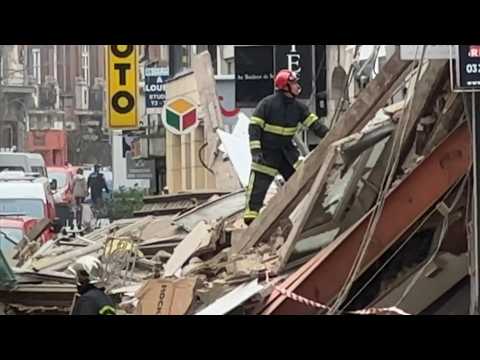 Scene after two buildings collapse in northern France, leaving one missing