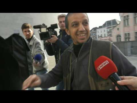 Imam arrives for appeal hearing after a Belgian court refuses to hand him over to France