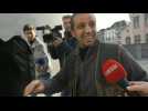 Imam arrives for appeal hearing after a Belgian court refuses to hand him over to France