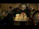 Hungarian charity prepares and distributes more than 2,000 sandwiches for the needy