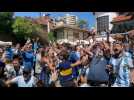 Fans react in Buenos Aires as Argentina beat France on penalties