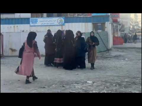 Afghan women near university after Taliban bans higher education for women