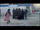 Afghan women near university after Taliban bans higher education for women