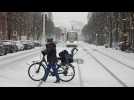 People in Europe and US deal with floods, tornadoes, delayed flights and snow
