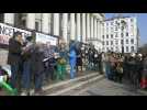 In Lyon, supporters of Italian activist Vincenzo Vecchi protest outside court