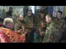 Les soldats ukrainiens cherchent le réconfort dans la foi et la prière
