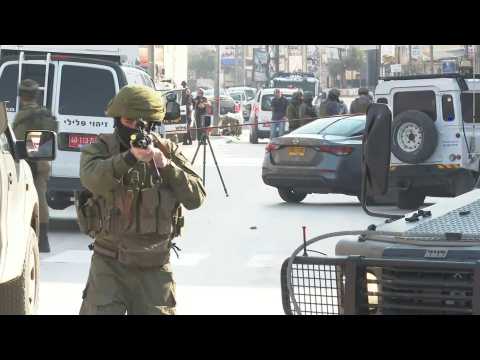 Israeli soldiers gather at scene of attack in West Bank's Huwara