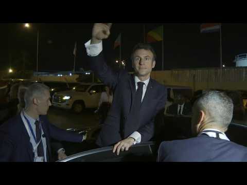 Macron arrives in Gabon, welcomed by cheers at the airport