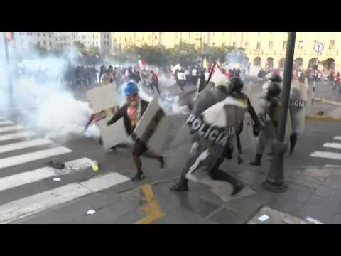 Anti-government protesters and police clash in Peru amid unrest