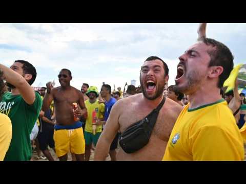 Brazilian fans celebrate the goal against Switzerland in Rio de Janeiro