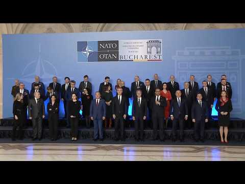 NATO foreign ministers pose for family photo as meeting in Bucharest opens