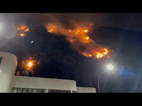 Rio de Janeiro: Fire burns on a hill in Copacabana