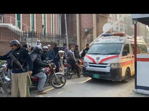 Ambulances arrive at heavily-guarded Pakistan blast site compound