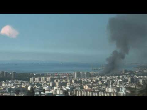 Smoke billows over Iskenderun four days after Turkey quake