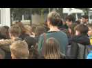 Minute of silence held for teacher slain in southwest France