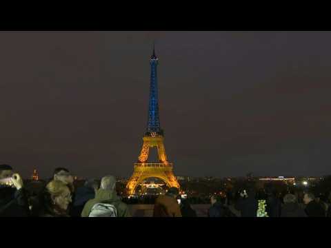 Eiffel Tower lit up in Ukraine colours as conflict heads into second year