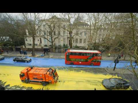 Road outside Russian embassy to UK painted colours of Ukrainian flag