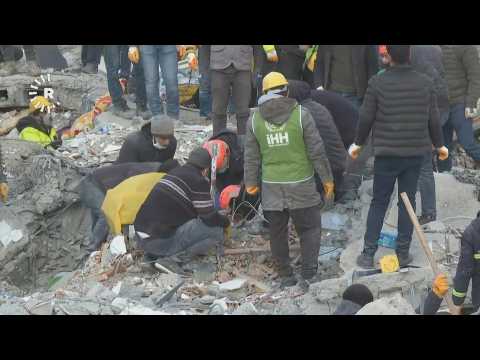 Rescue workers search for earthquake survivors in Diyarbakir, Turkey