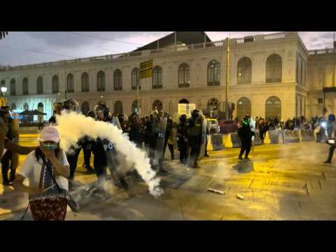 Peruvian protesters clash with police during anti-government march in Lima