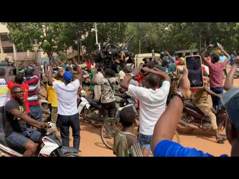 Burkina Faso military and protesters head towards national television station