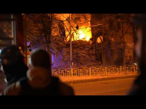 Firemen extinguish fire following strikes on Ukraine's Zaporizhzhia