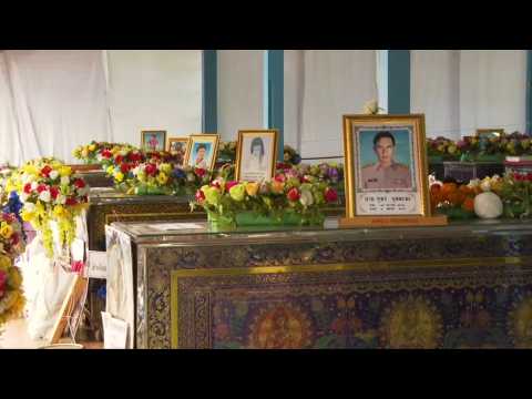 Buddhist funeral rites and prayers begin for Thai massacre victims