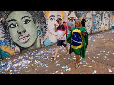 Brazil election: Lula leads Bolsonaro in polls as country votes in tense presidential contest