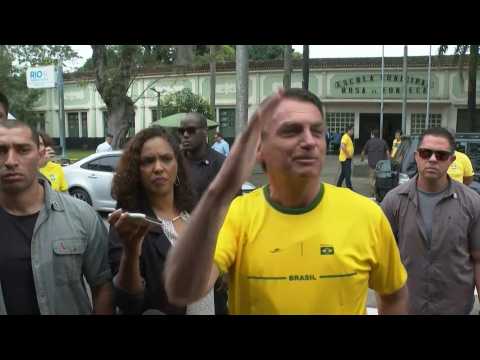 Brazil incumbent Bolsonaro arrives to cast vote in election