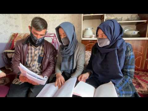 Brother and sister's futures separated by Taliban university ban
