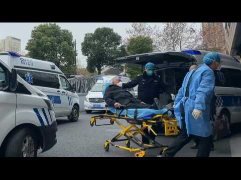Ambulances transporting patients arrive at Shanghai hospital