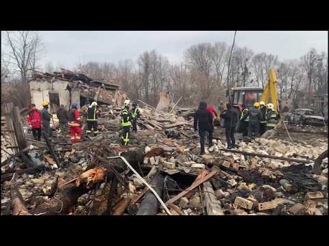 Rescuers and debris after Russia fires missiles on Ukraine's Kyiv