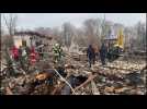 Rescuers and debris after Russia fires missiles on Ukraine's Kyiv