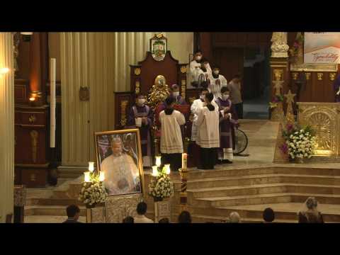 Filipino Catholics hold requiem mass for ex-pontiff Benedict