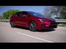 2023 Toyota Corolla SE Hybrid in Ruby Flare Pearl Driving Video