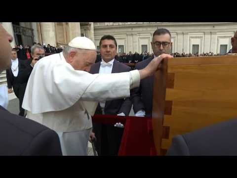 Ex-pope Benedict XVI's coffin taken to be buried