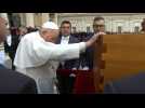 Ex-pope Benedict XVI's coffin taken to be buried